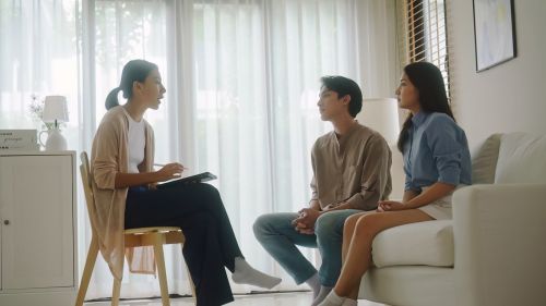 Family lawyer talking to couple. Divorce Mediation in Maryland: What to Know concept.